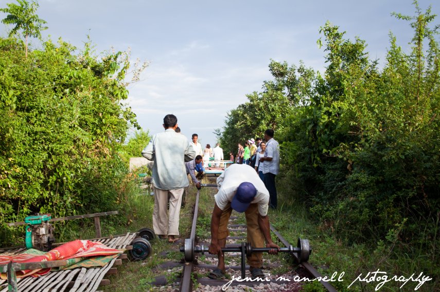Taking apart the cars so we could pass.