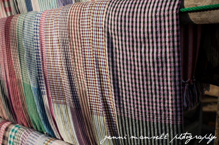 Scarves for sale at the rest stop along the tracks.