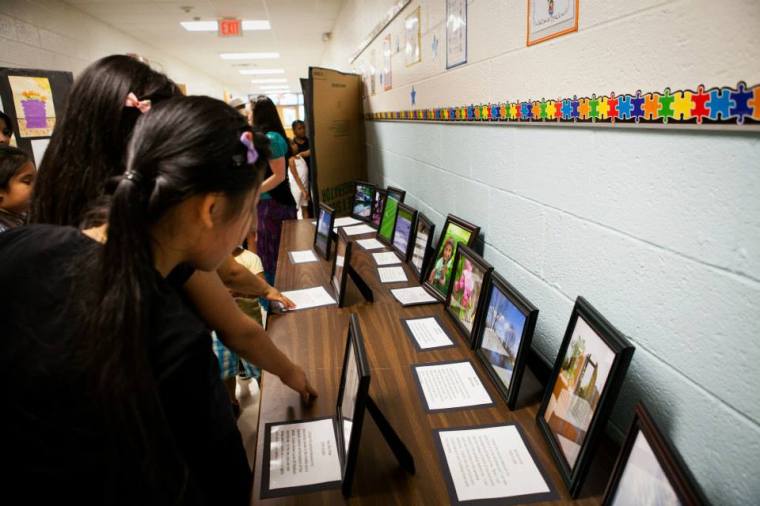 They had a great time showing their photos to family and friends after the program!
