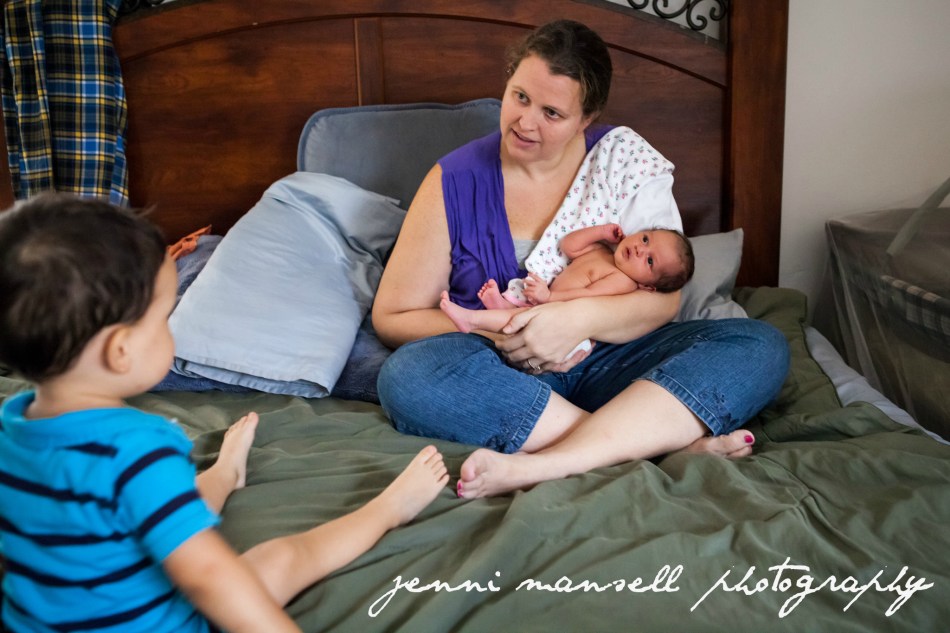 Big brother checking out little sister!