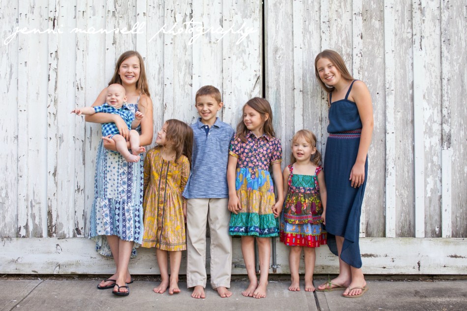 Daddy made the littlest one laugh! I love capturing slightly candid moments like this. :)